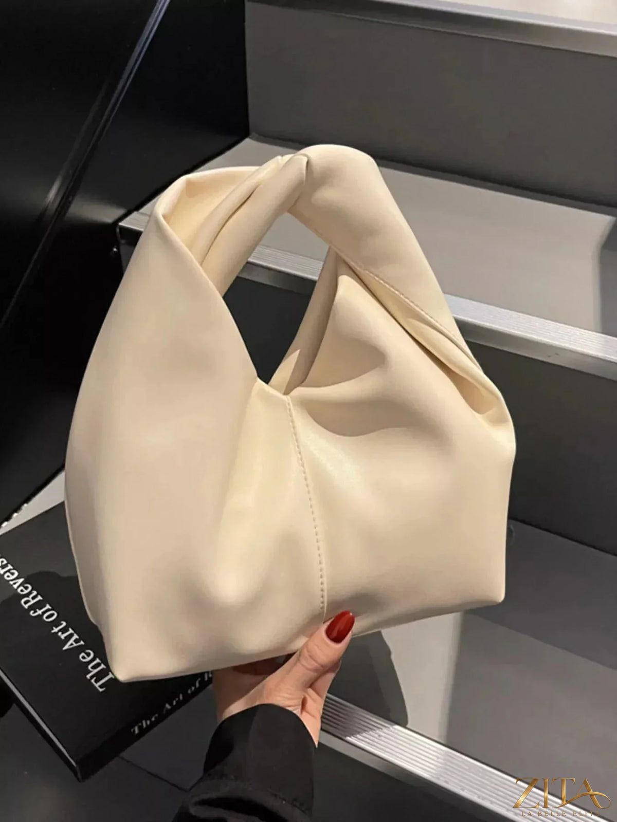 Zita La Belle Elite Knot Handle Leather Handbag with stylish leather strap and elegant design, displayed on a neutral background.