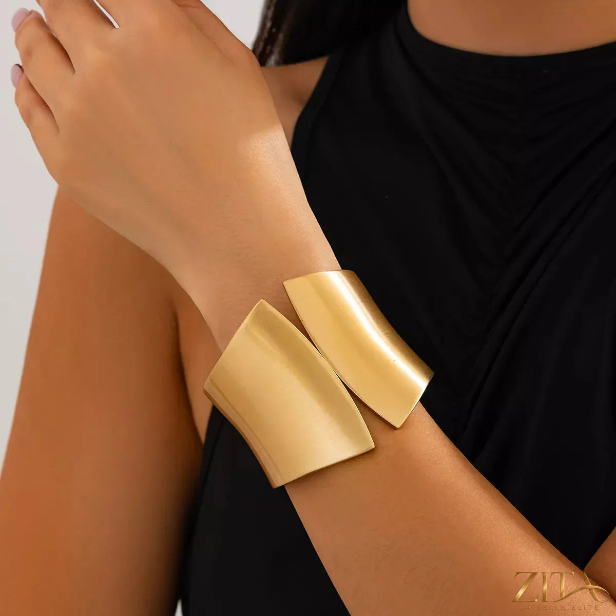 Zita La Belle Elite wide cuff bracelet with intricate metal design and open-ended style, stylish jewelry accessory.