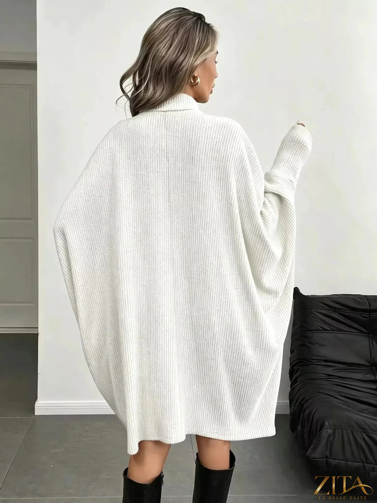 Zita La Belle Elite oversized batwing sleeve ribbed knit turtleneck dress in black, featuring a relaxed fit and textured fabric.
