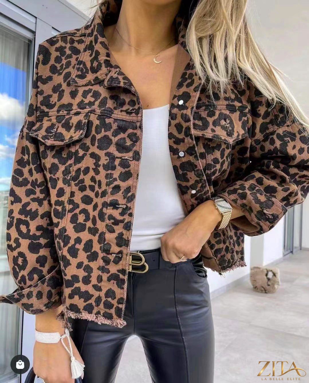 Leopard print raw hem denim jacket by Zita La Belle Elite featuring a stylish leopard pattern and distressed raw hem design.