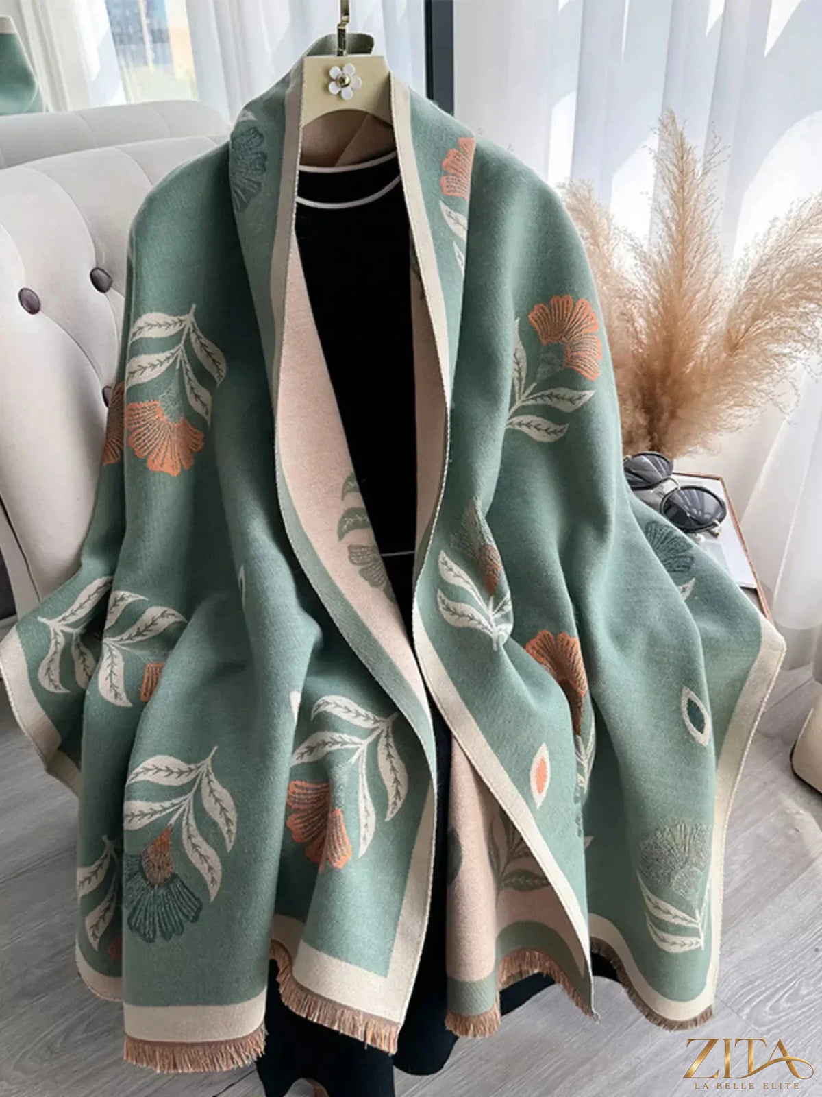 Printed raw hem shawl by Zita La Belle Elite featuring intricate patterns and a stylish raw edge design.