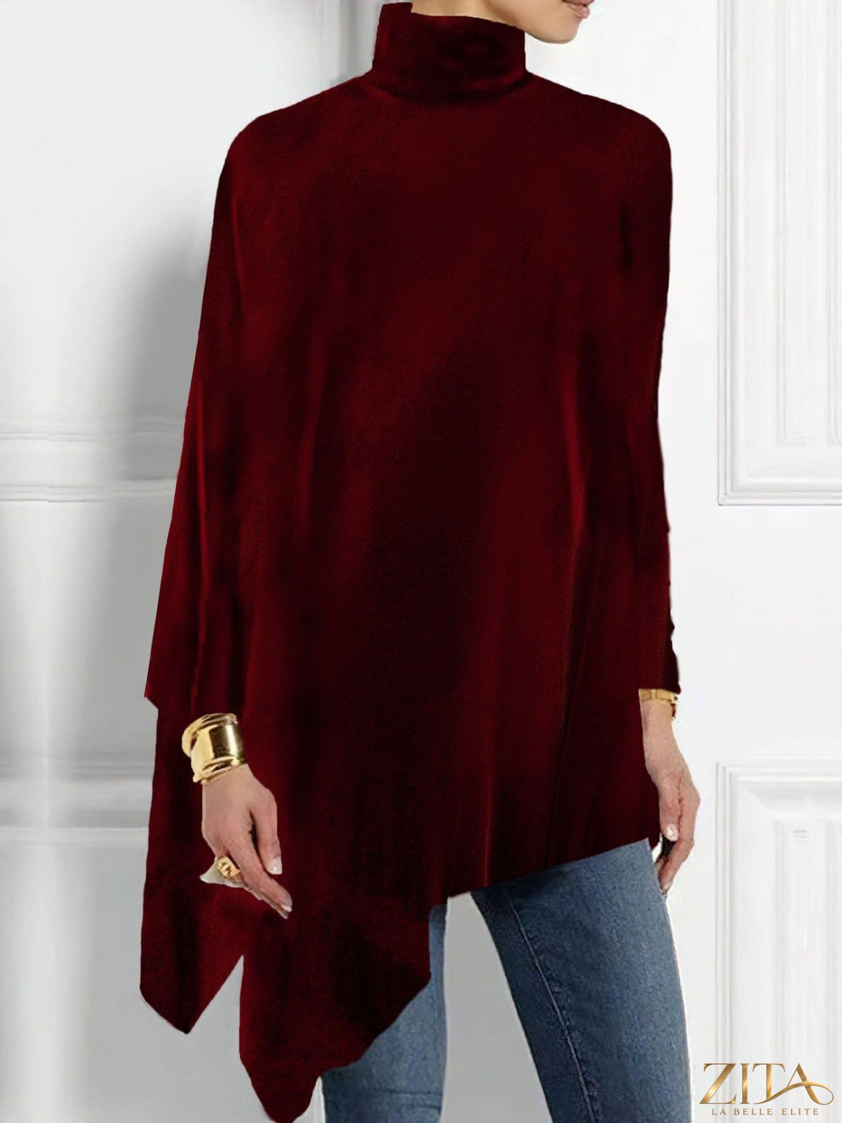 Elegant turtleneck asymmetric hem top by Trendsi, featuring a stylish high neck and unique hem design for a chic look.