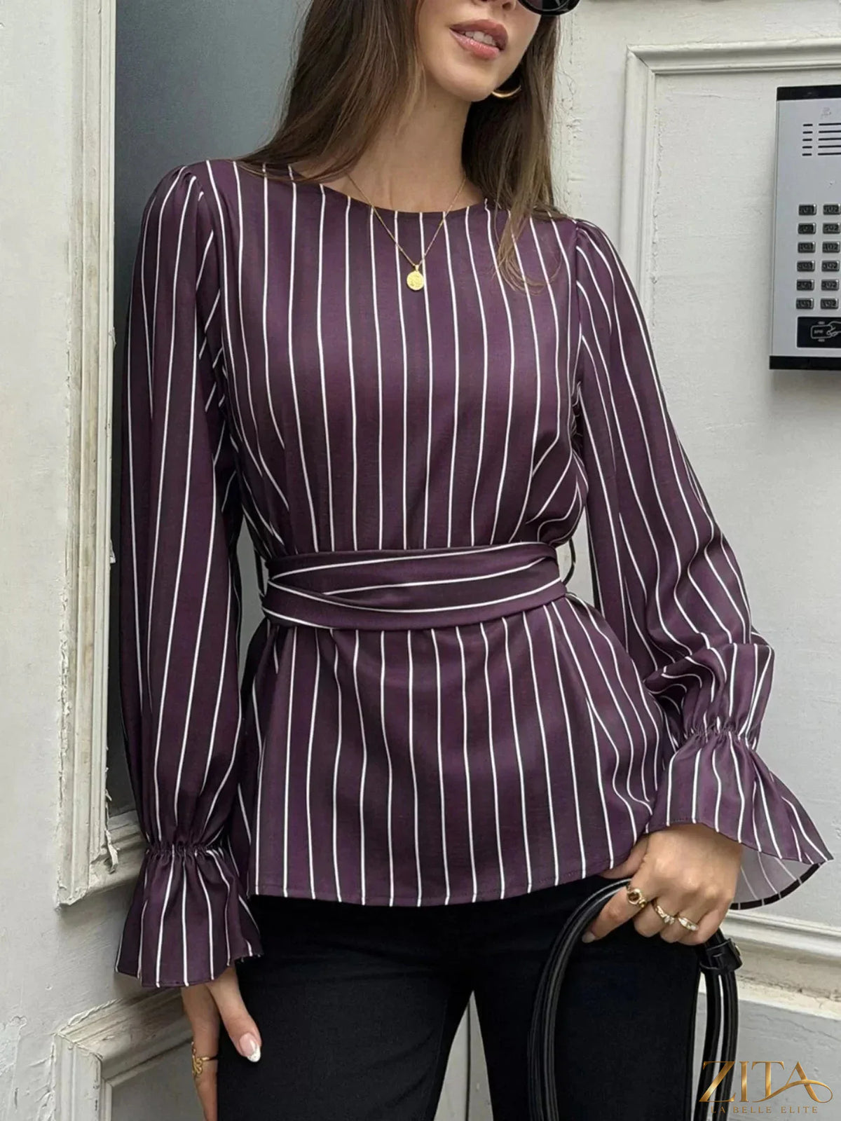 Zita La Belle Elite striped flounce sleeves blouse with ruffled details and a relaxed fit, perfect for casual or dressy occasions.