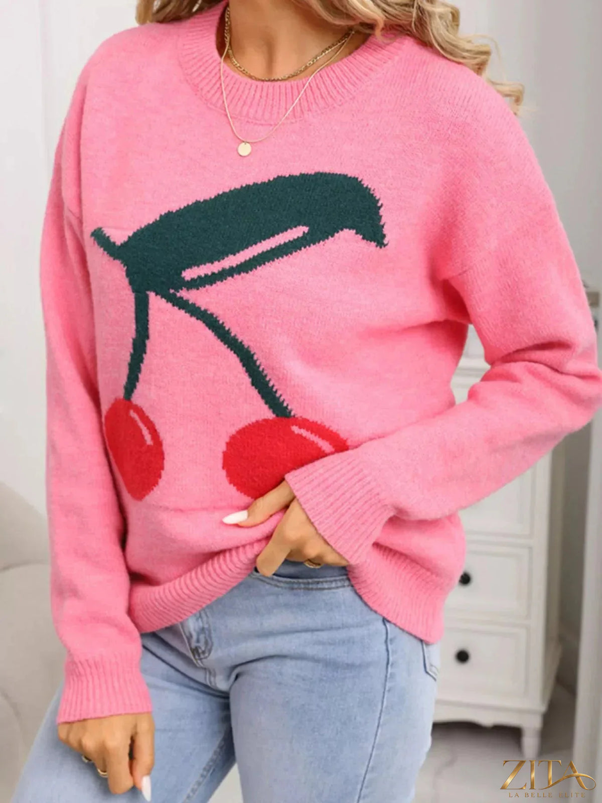 Cherry-colored round neck sweater by Trendsi, close-up of soft knit fabric and classic fit, showcasing stylish casual wear