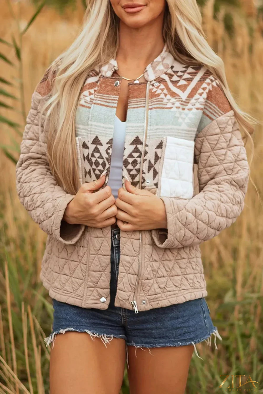 Aztec quilted patchwork western jacket by Zita La Belle Elite, featuring colorful geometric patterns and a classic western silhouette.