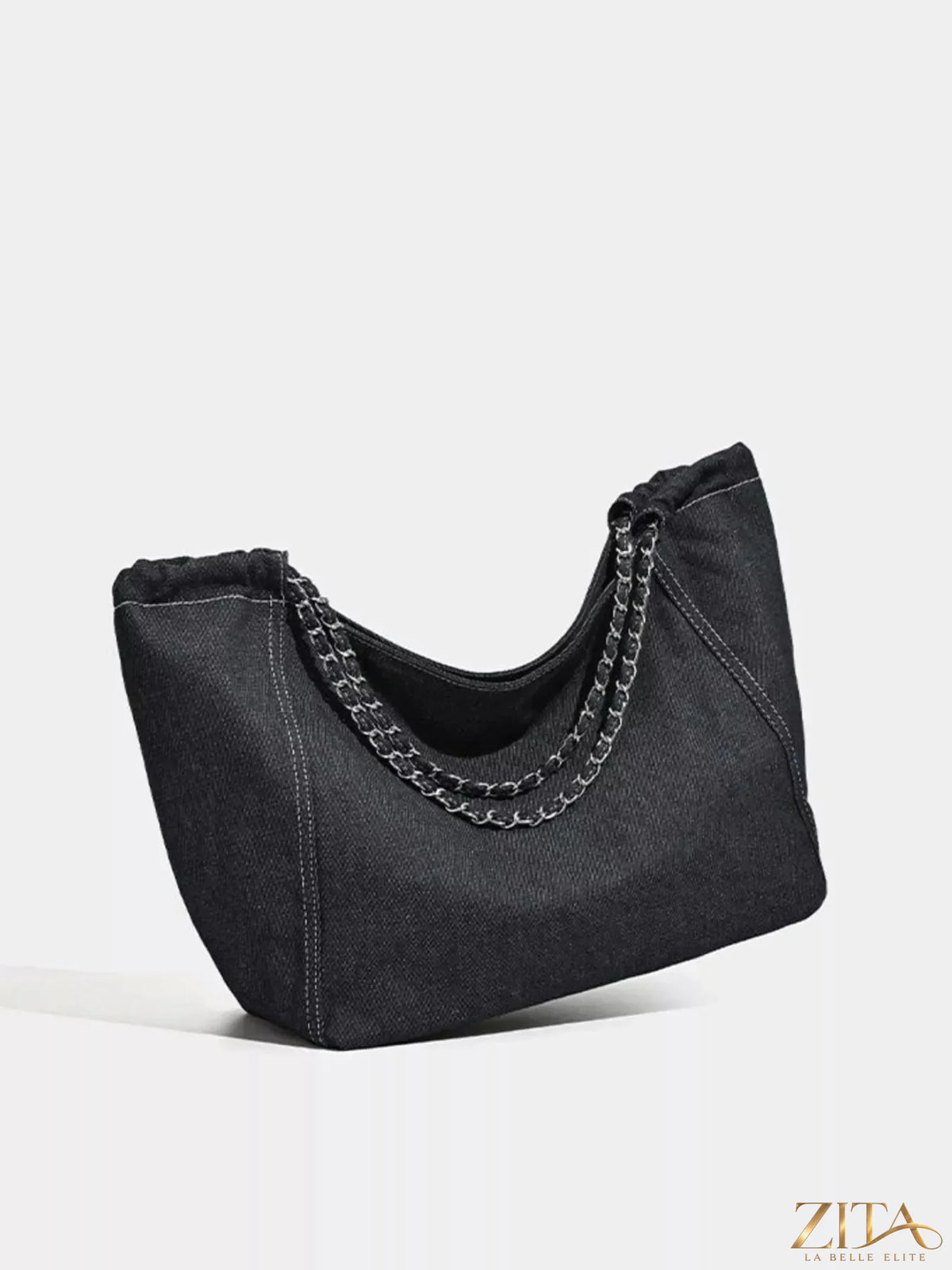 Zita La Belle Elite chain strap tote bag with black leather and gold hardware, showing the front view with handle and chain details.