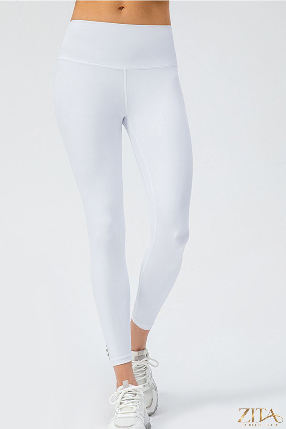 Trendsi wide waistband slim fit active leggings shown on a model, featuring a comfortable fit and stretchy fabric for exercise or casual wear.