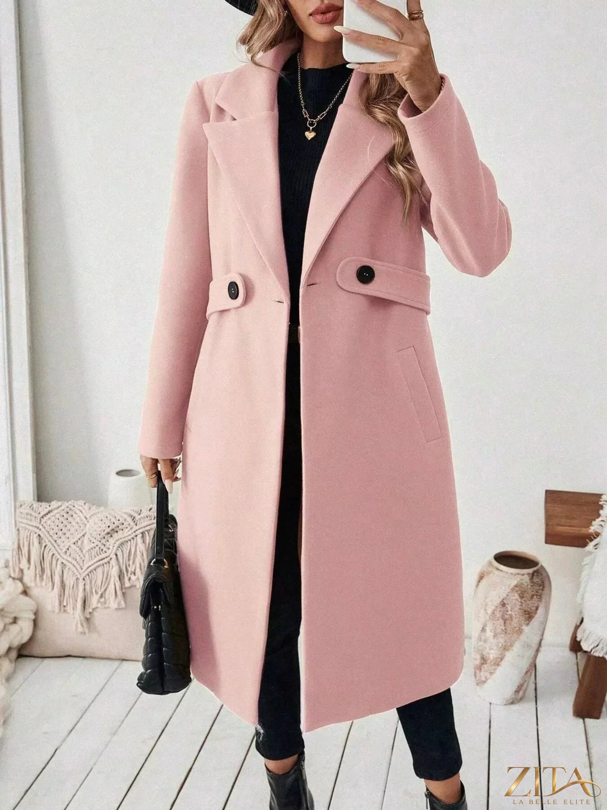 Zita La Belle Elite single-button longline coat displayed on a hanger, showcasing its sleek design and tailored fit.