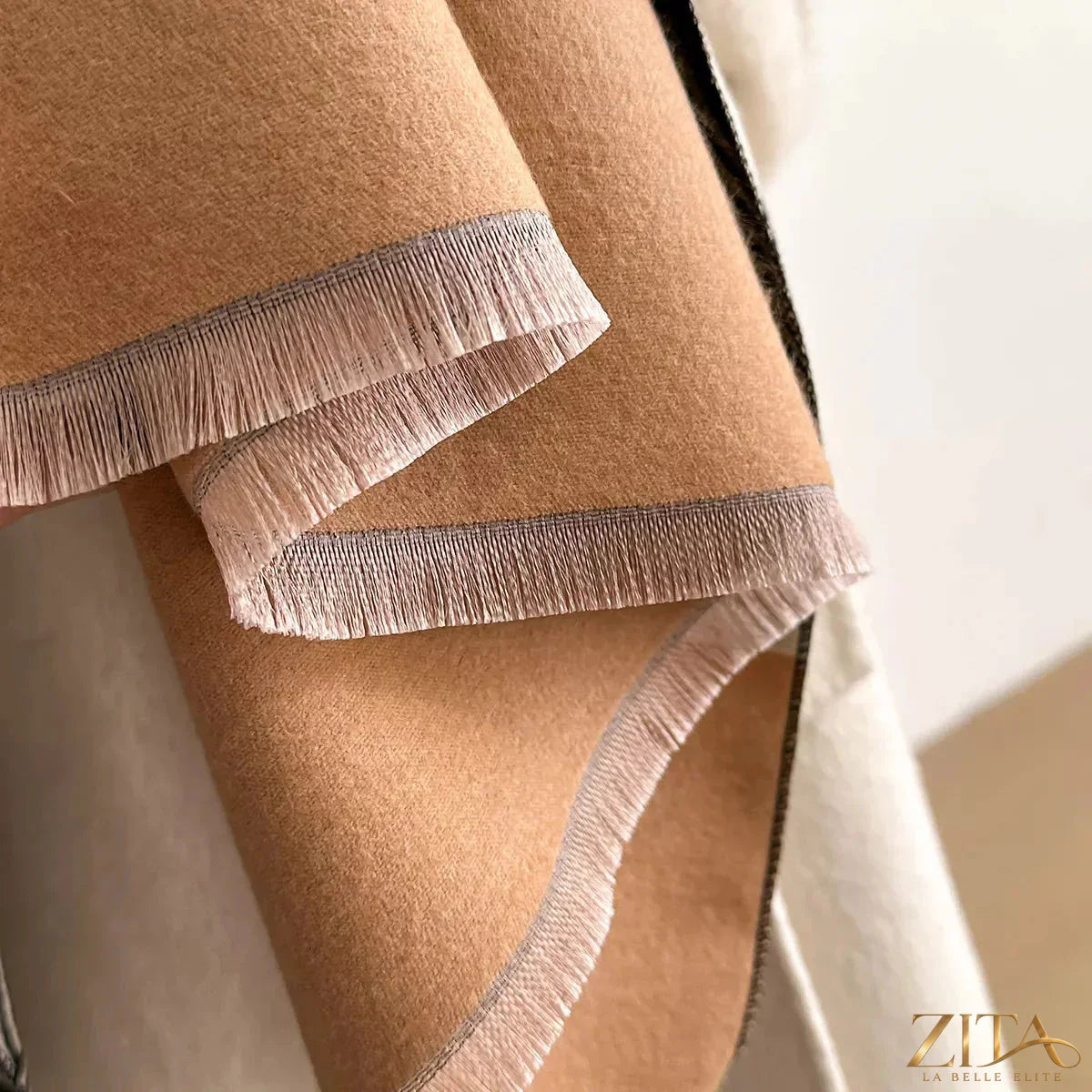 Zita La Belle Elite geometric pattern raw hem scarf featuring a modern abstract design and fringed edges.