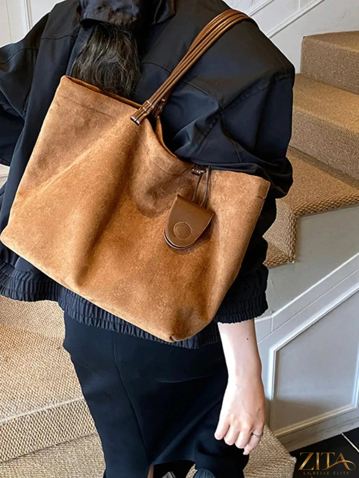 Classic suede tote bag by Zita La Belle Elite featuring soft suede material and spacious interior for everyday carry.