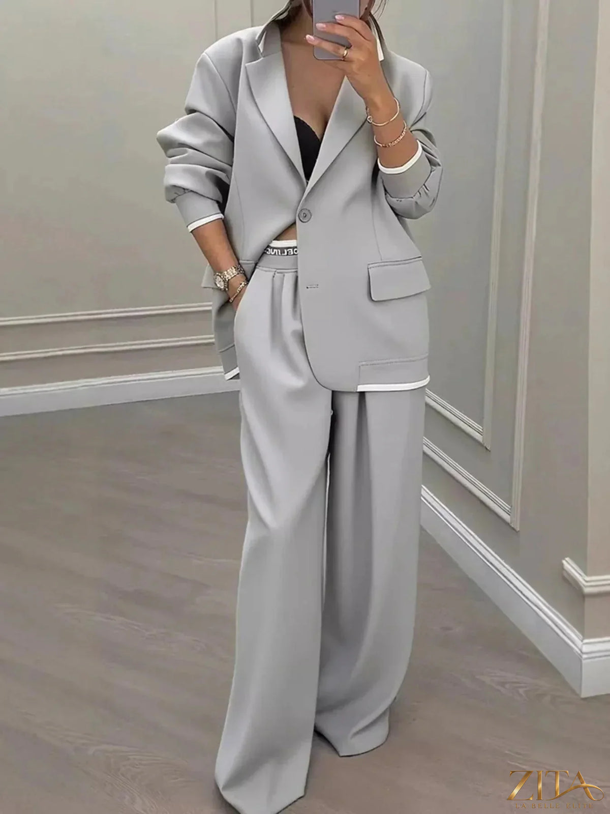 Plus size Zita La Belle Elite blazer and wide-leg pants set featuring a single-button blazer and matching wide-leg trousers.