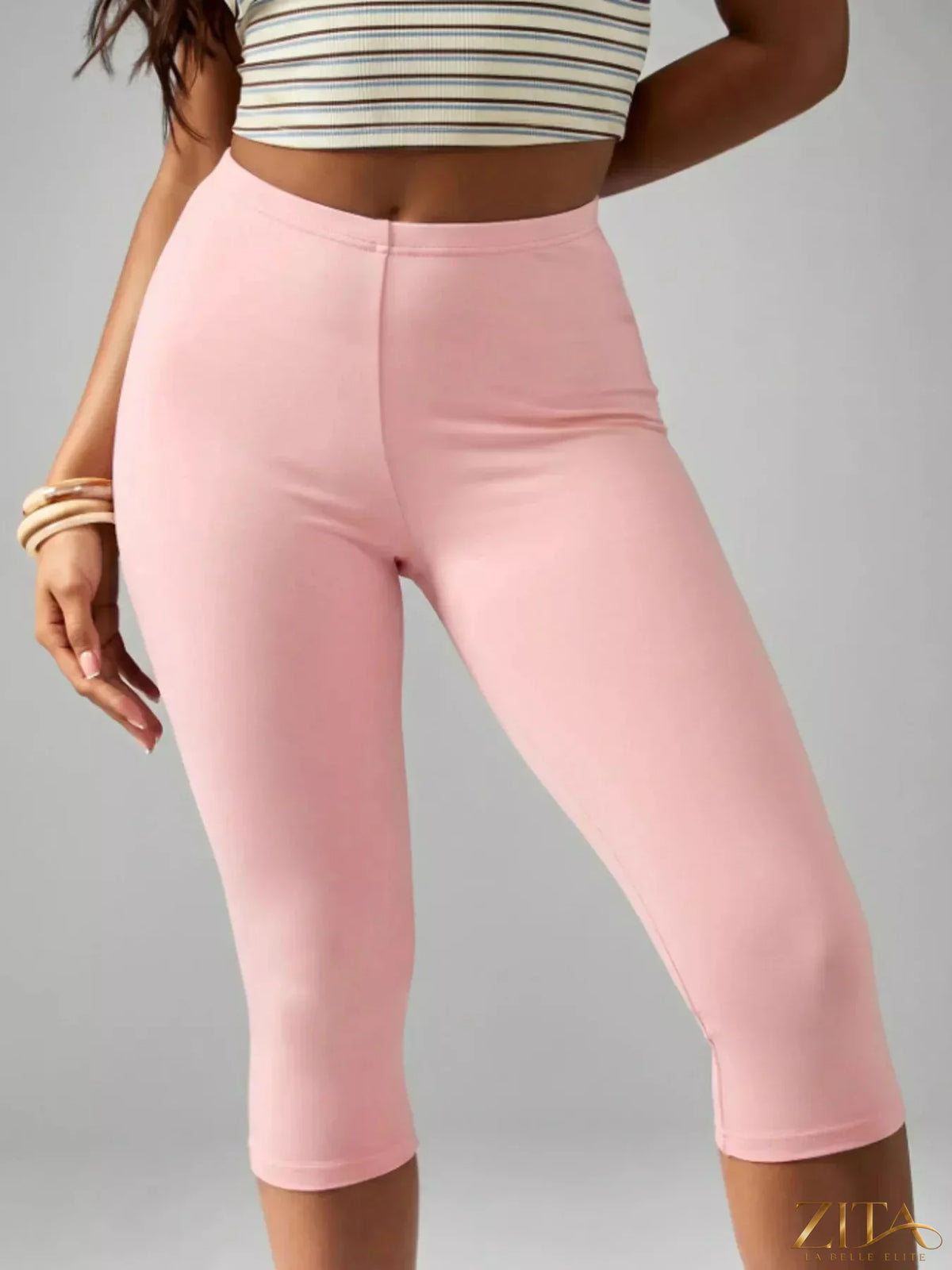 Zita La Belle Elite high-waisted active capri leggings with a sleek, form-fitting design, perfect for workout and athletic activities.