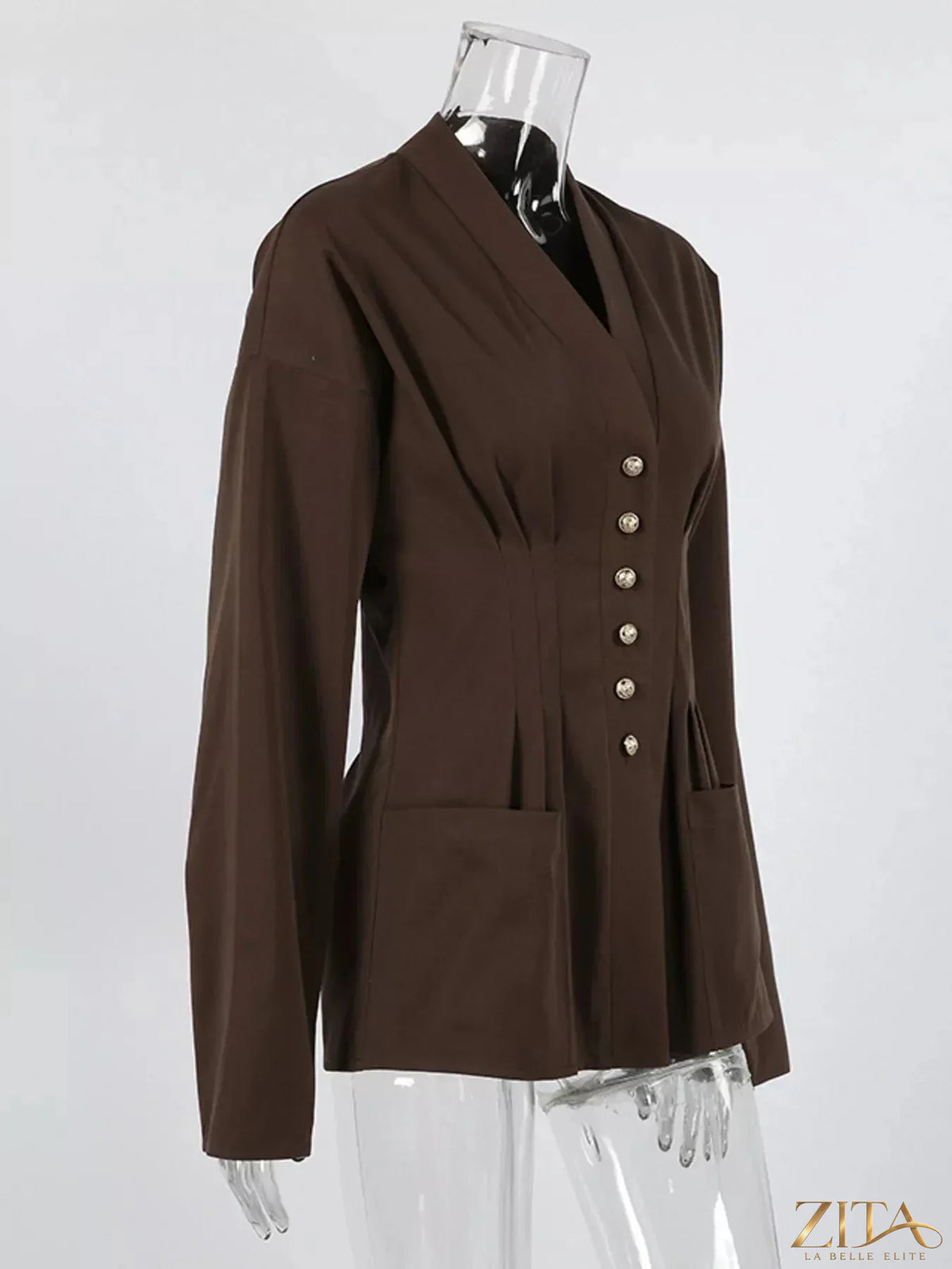 Zita La Belle Elite pleated waist blouse with button detail, featuring a stylish fit and elegant design in a soft fabric.