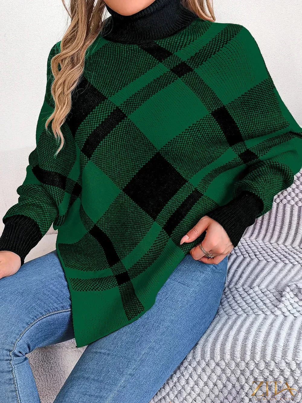 Plaid turtleneck batwing sleeve sweater from Trendsi featuring a cozy, stylish design with a plaid pattern and relaxed fit.