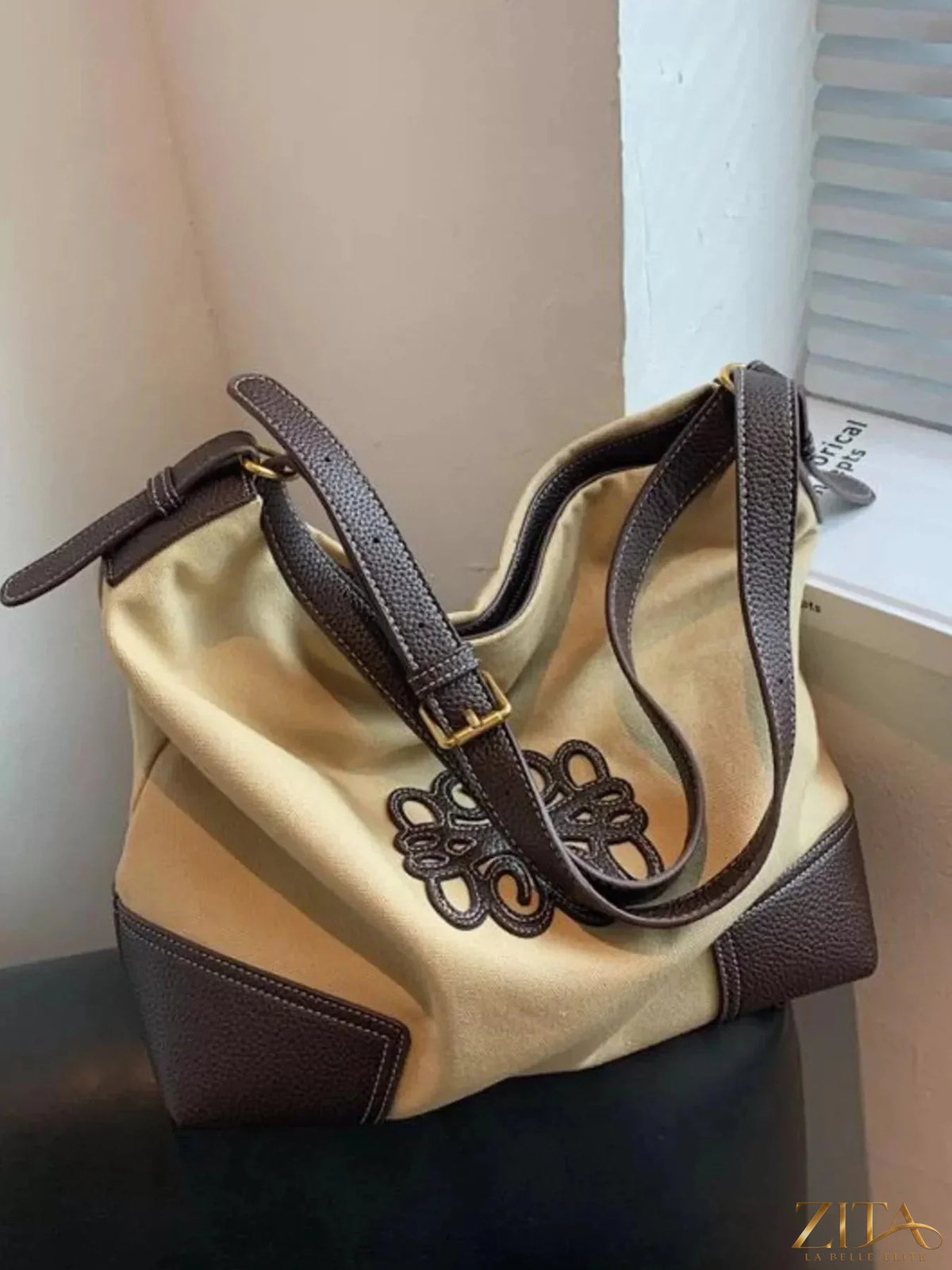 Embroidered canvas tote bag by Zita La Belle Elite with colorful floral embroidery and sturdy handles for everyday use.