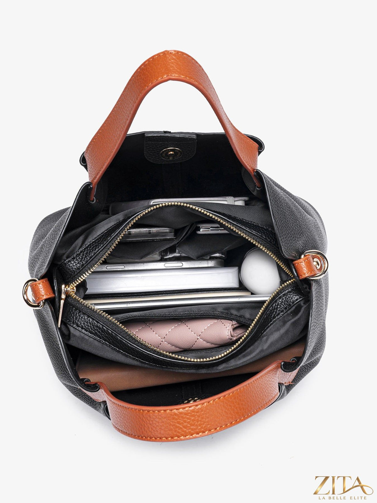 Leather contrast handle handbag by Trendsi featuring a sleek design with a sturdy leather strap and stylish accents.