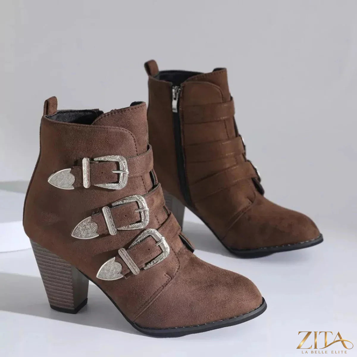 Point toe black block heel boots by Trendsi featuring sleek design and sturdy heels, perfect for stylish everyday wear.