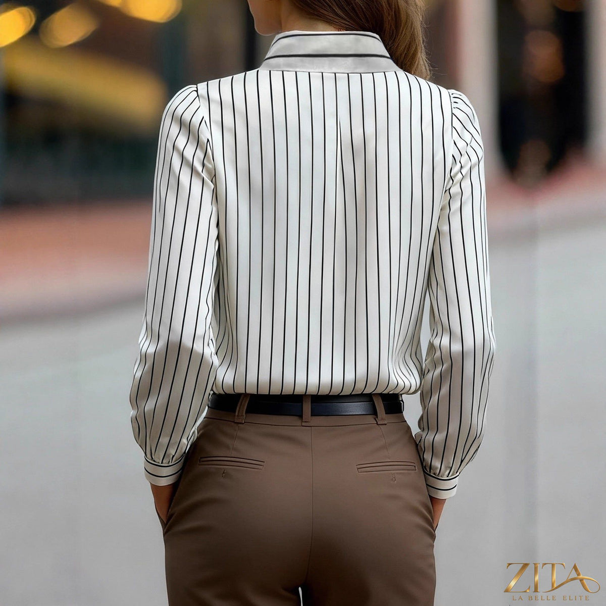 Black and white striped satin lapel shirt by Zita La Belle Elite, featuring silky fabric and stylish lapel design.