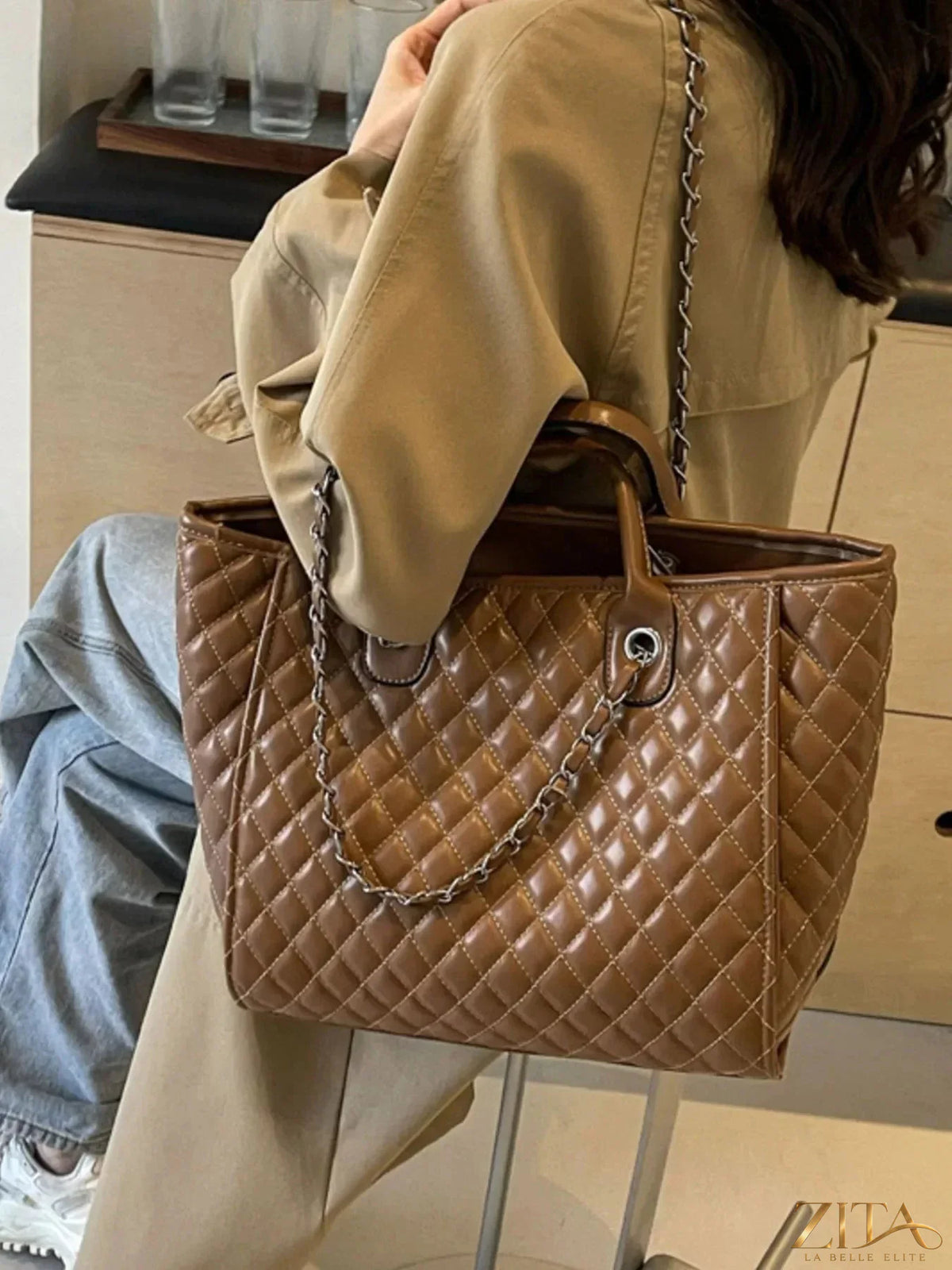 Zita La Belle Elite quilted chain shoulder bag with elegant design and gold-tone chain strap on a neutral background.