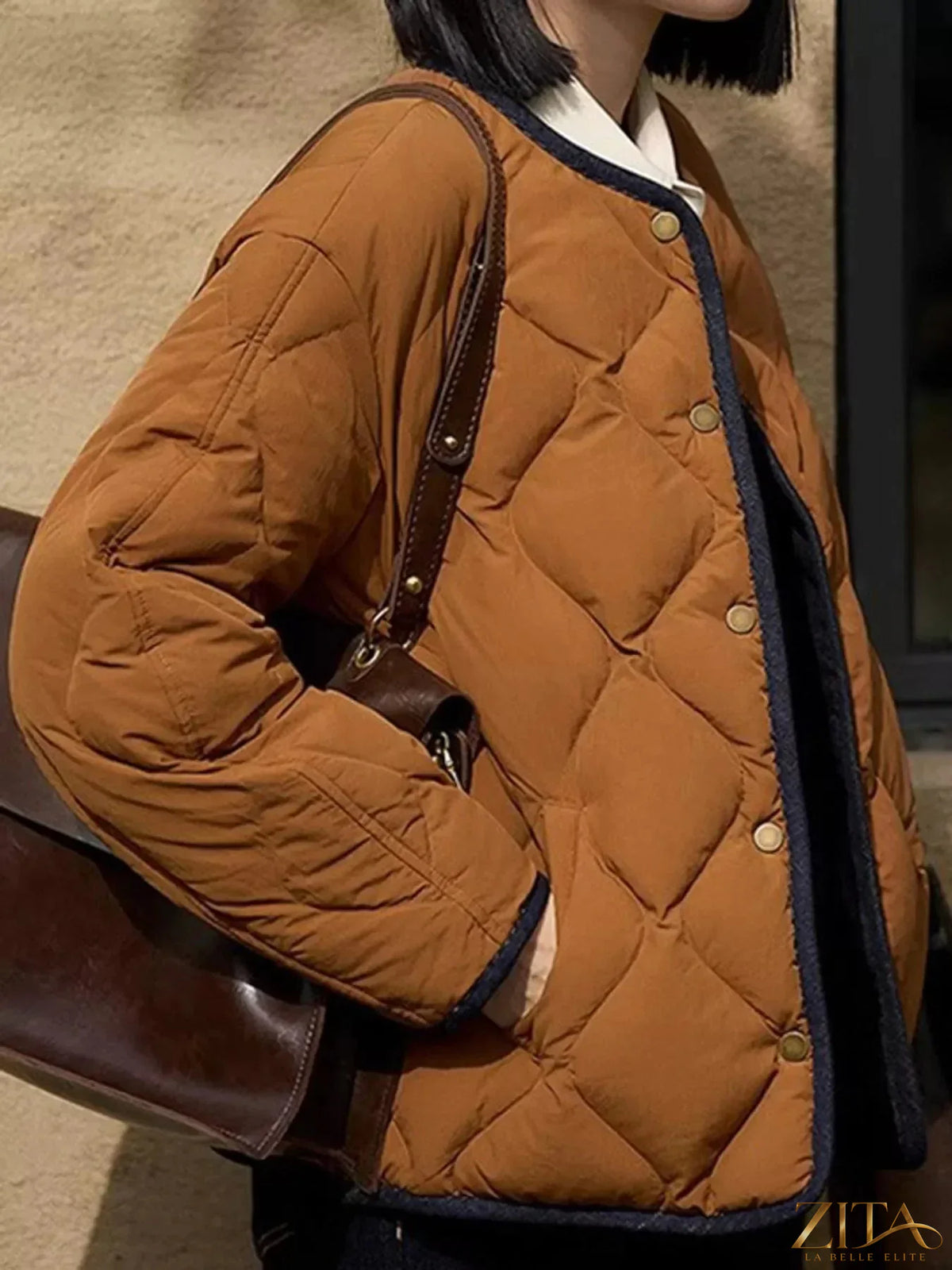 Diamond-quilted lightweight cropped reversible down jacket by Zita La Belle Elite, shown in a stylish, reversible design with down filling.