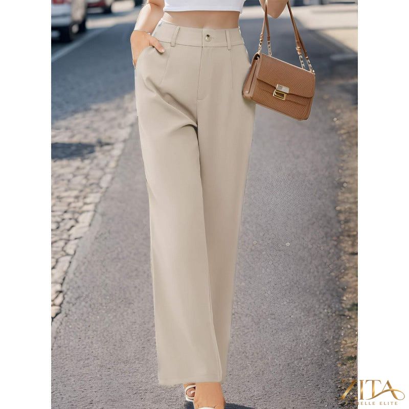 Elegant women's suit pants with pockets by Zita La Belle Elite, featuring a tailored fit and classic design.