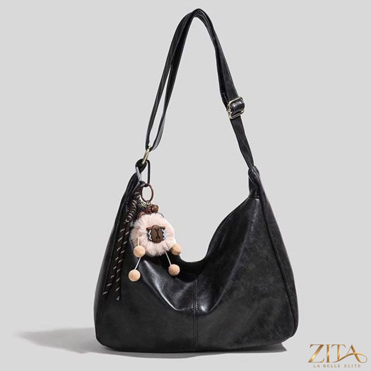 Vintage style hobo shoulder bag by Zita La Belle Elite with leather strap and worn finish, casual accessory for everyday use.
