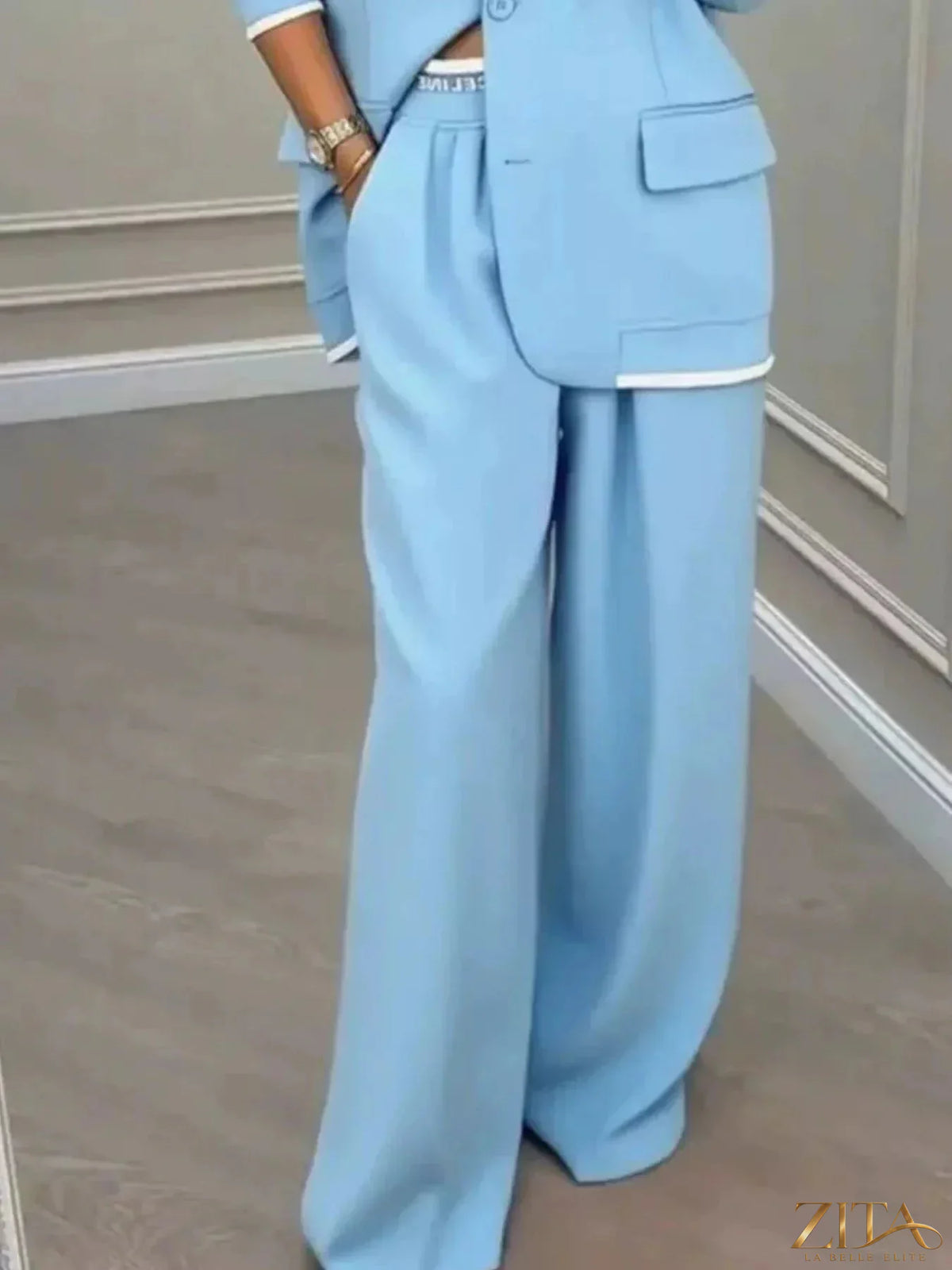 Plus size Zita La Belle Elite blazer and wide-leg pants set, featuring a single-button blazer and flowing wide-leg trousers.