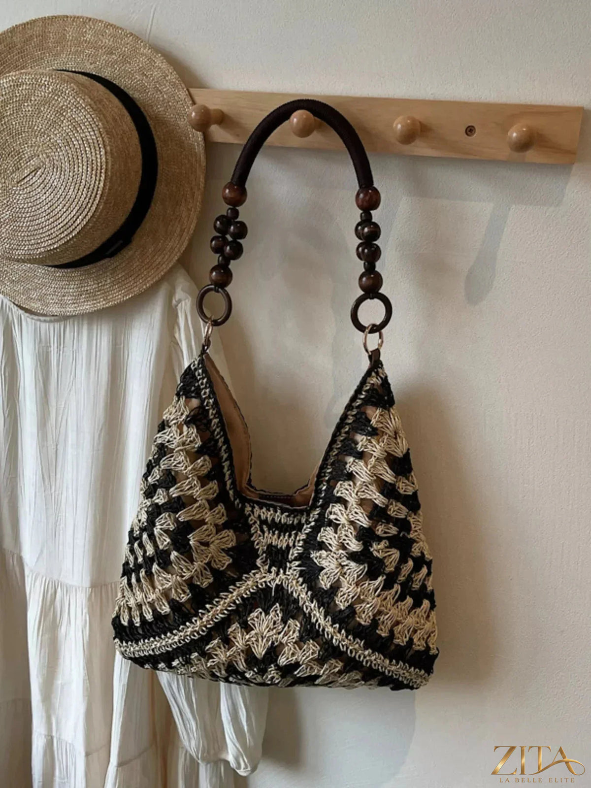 Zita La Belle Elite crochet hobo handbag with woven design and shoulder strap, stylish boho accessory for casual outings.