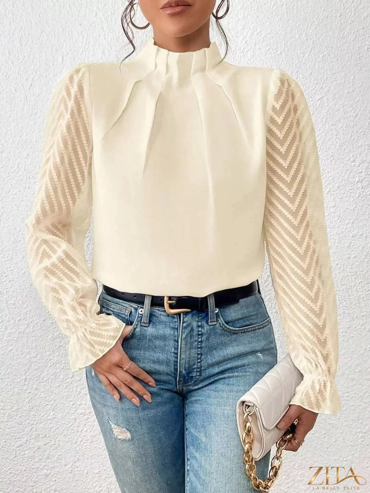 Zita La Belle Elite mock neck blouse with sheer lace sleeves, lightweight fabric, and elegant design.