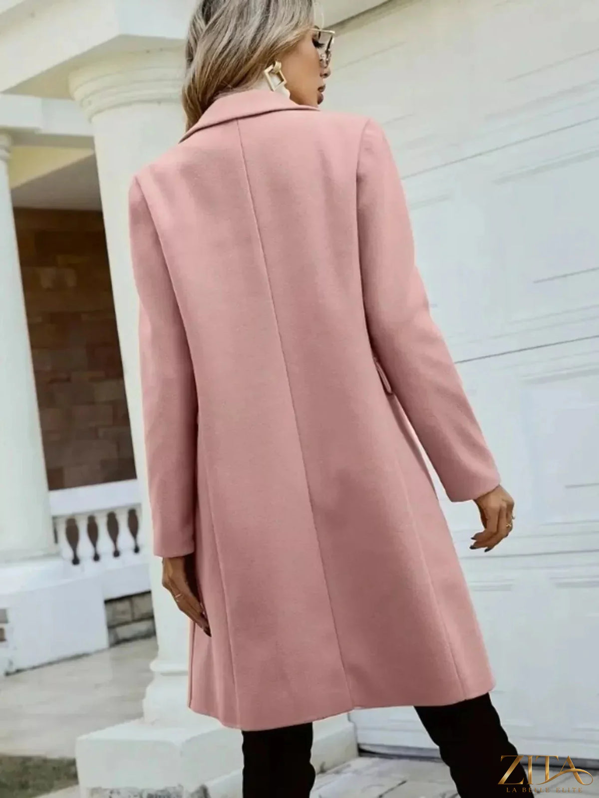 Zita La Belle Elite double-breasted longline coat featuring a tailored fit, lapel collar, and button closure in a stylish outerwear design.