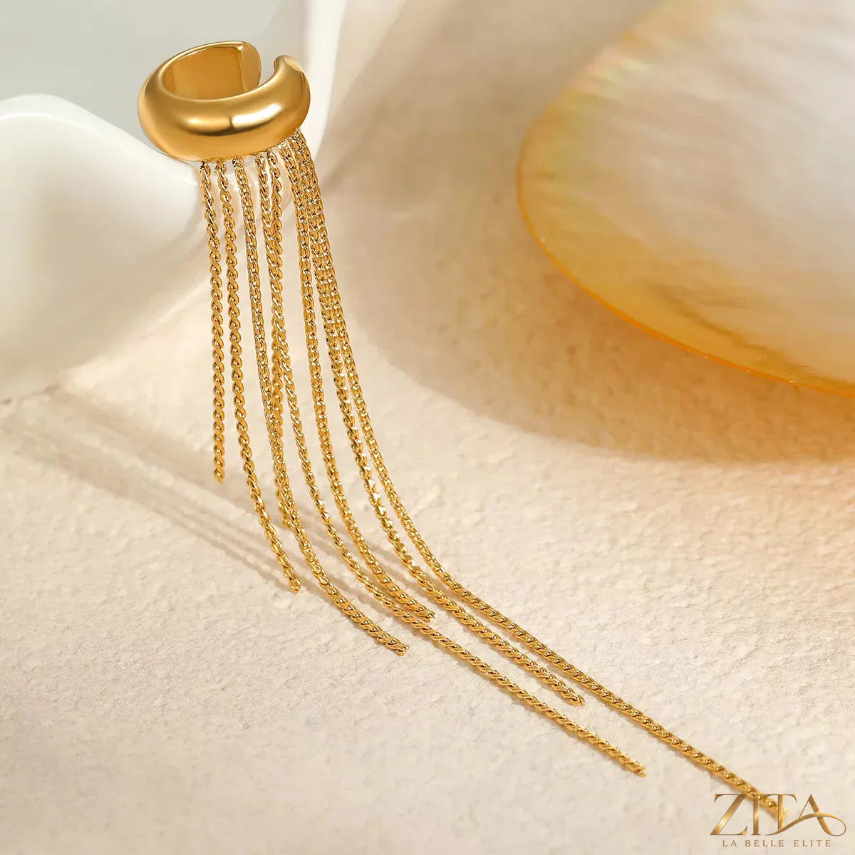 18K gold-plated tassel ear cuff earrings with delicate dangling tassels, designed by Zita La Belle Elite for a stylish look.