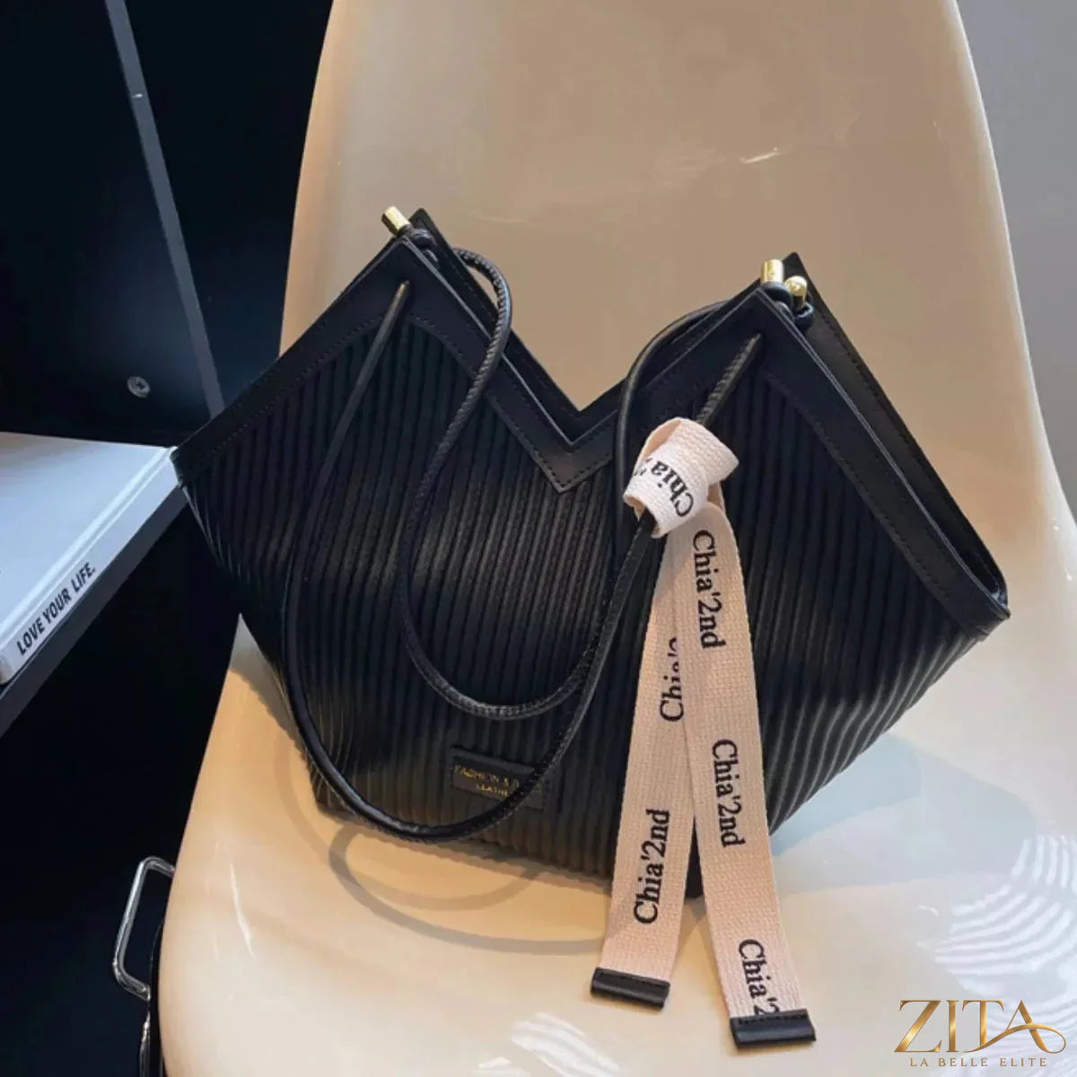 Leather textured shoulder bag by Zita La Belle Elite featuring a sleek design and sturdy strap, perfect for everyday use.