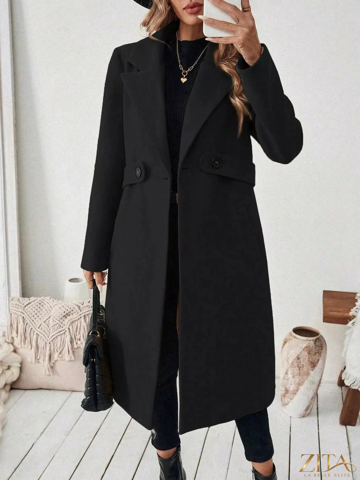 Zita La Belle Elite single-button longline coat in neutral fabric, showcasing a sleek, tailored silhouette with a front button closure.