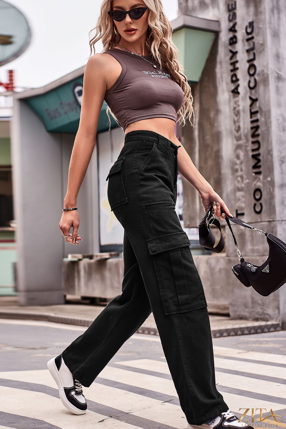 Zita La Belle Elite buttoned high waist loose fit jeans with front pockets and relaxed style, shown on a model.