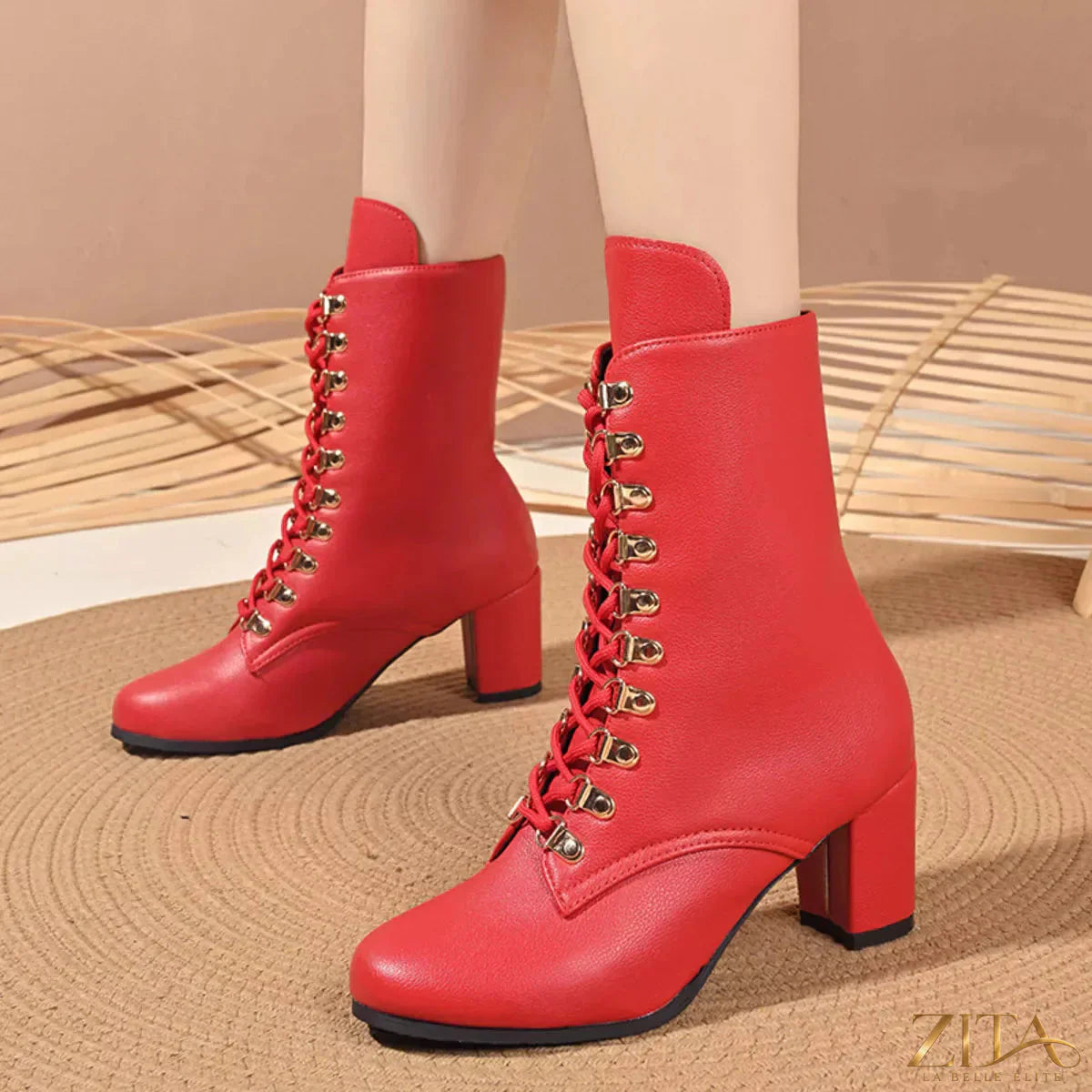 Zita La Belle Elite lace-up boots with a block heel, featuring stylish design and ankle-high length, on a white background.