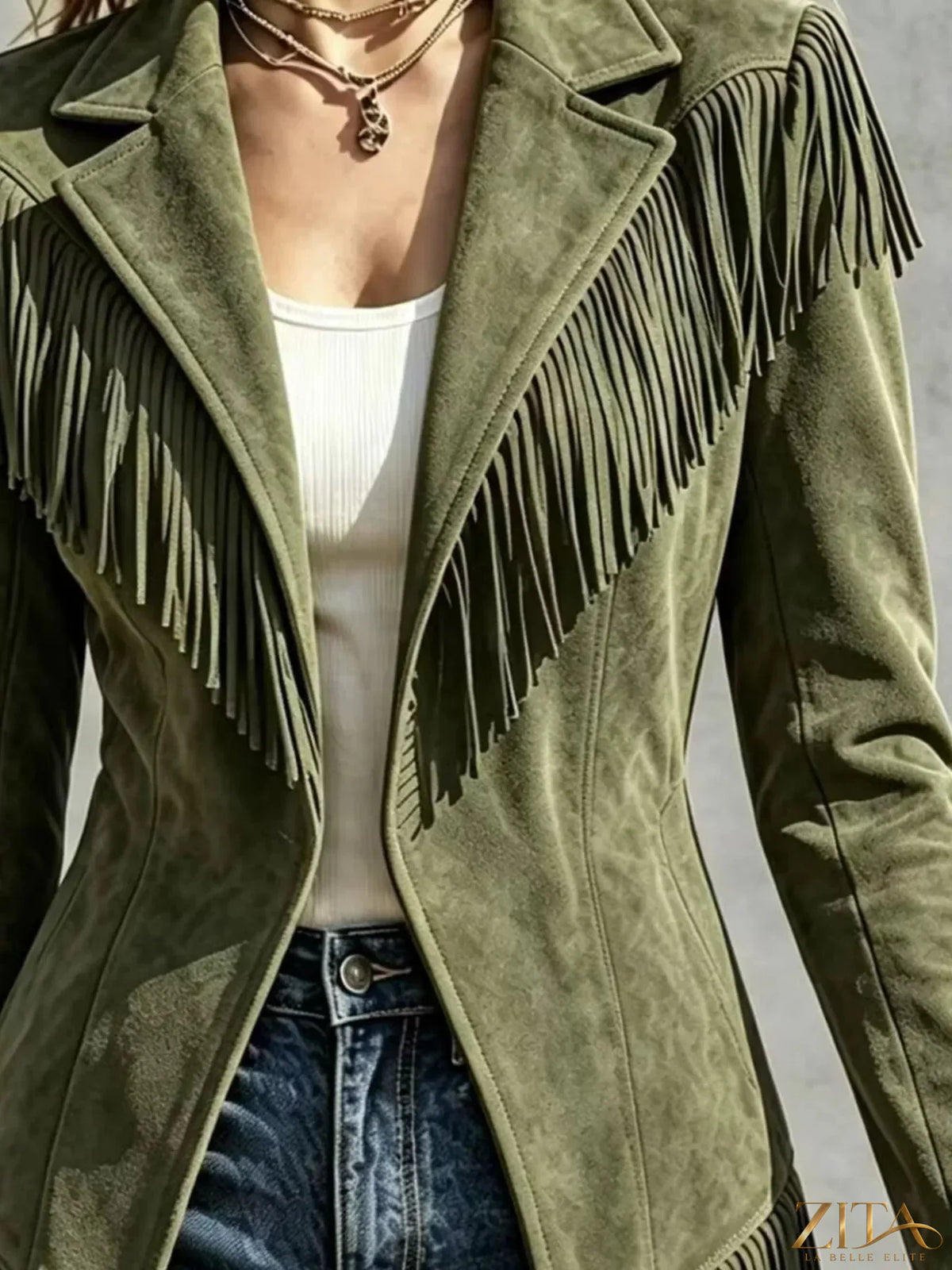 Western-inspired fringed open front jacket from Trendsi featuring a stylish design and detailed fringe accents.
