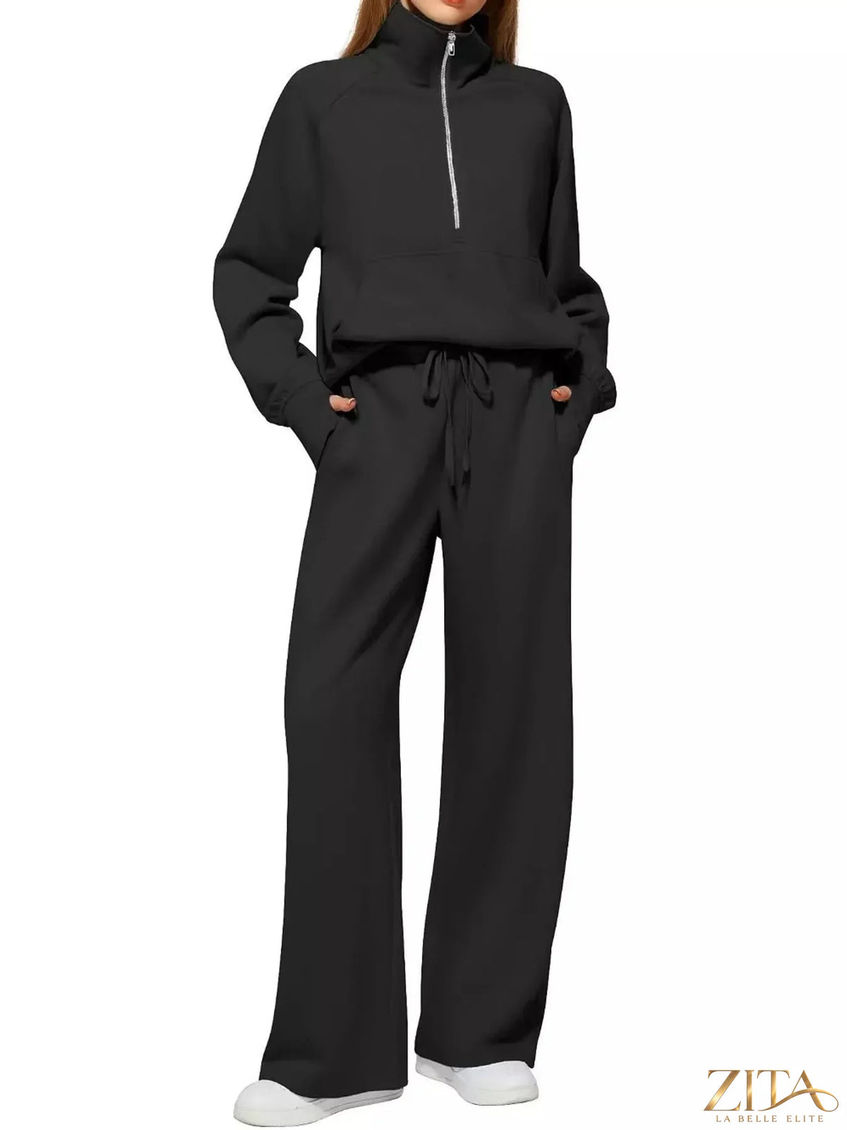Zita La Belle Elite half-zip sweatshirt and wide-leg pants set in soft fabric, displayed on a model in a casual indoor setting.