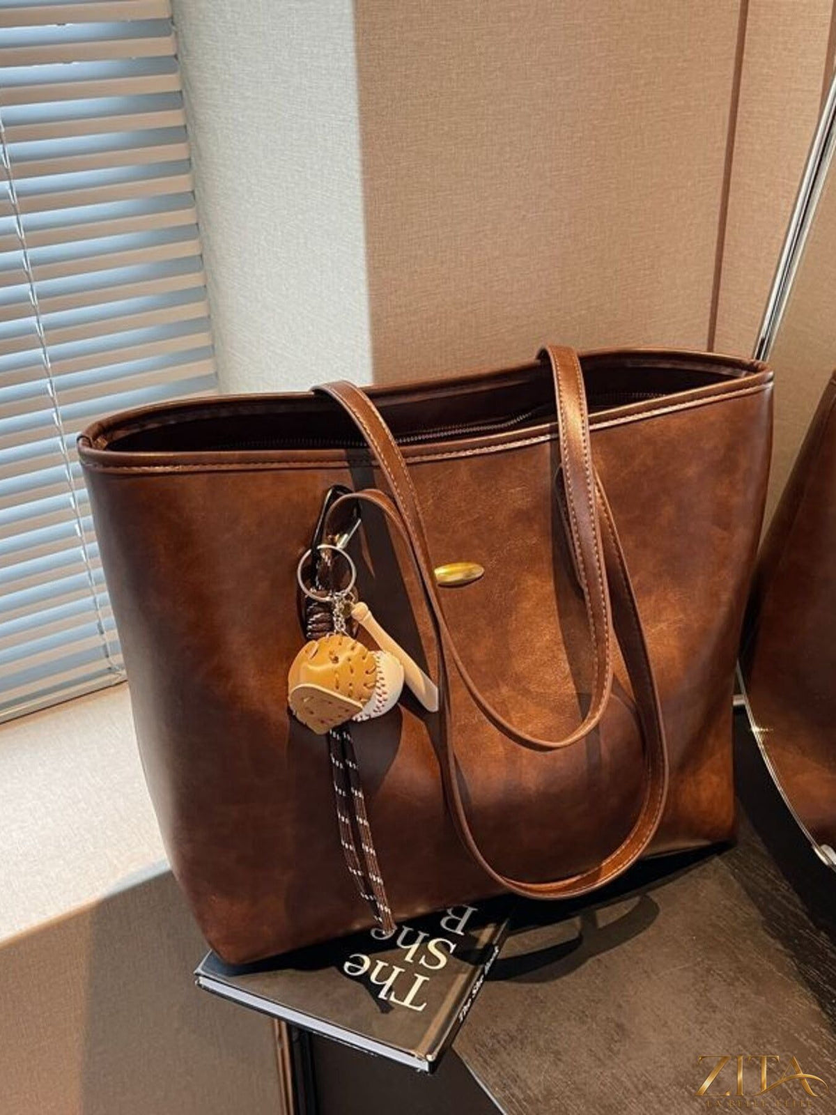 Vintage style leather tote bag by Zita La Belle Elite with sturdy handles and classic design, shown in natural leather finish.