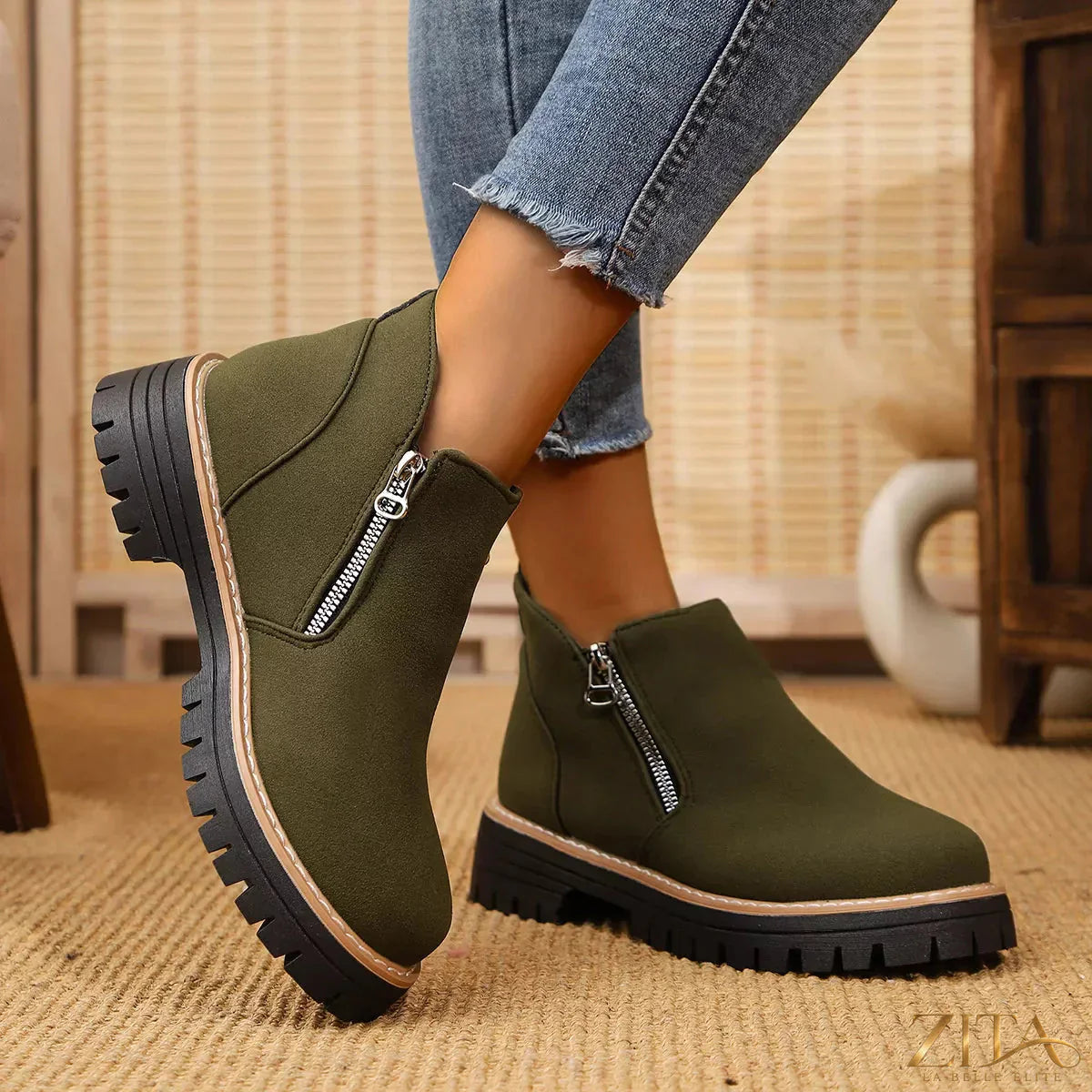 Zita La Belle Elite ankle boots with zipper accent, featuring stylish black leather and sleek design, perfect for casual or dressy wear.