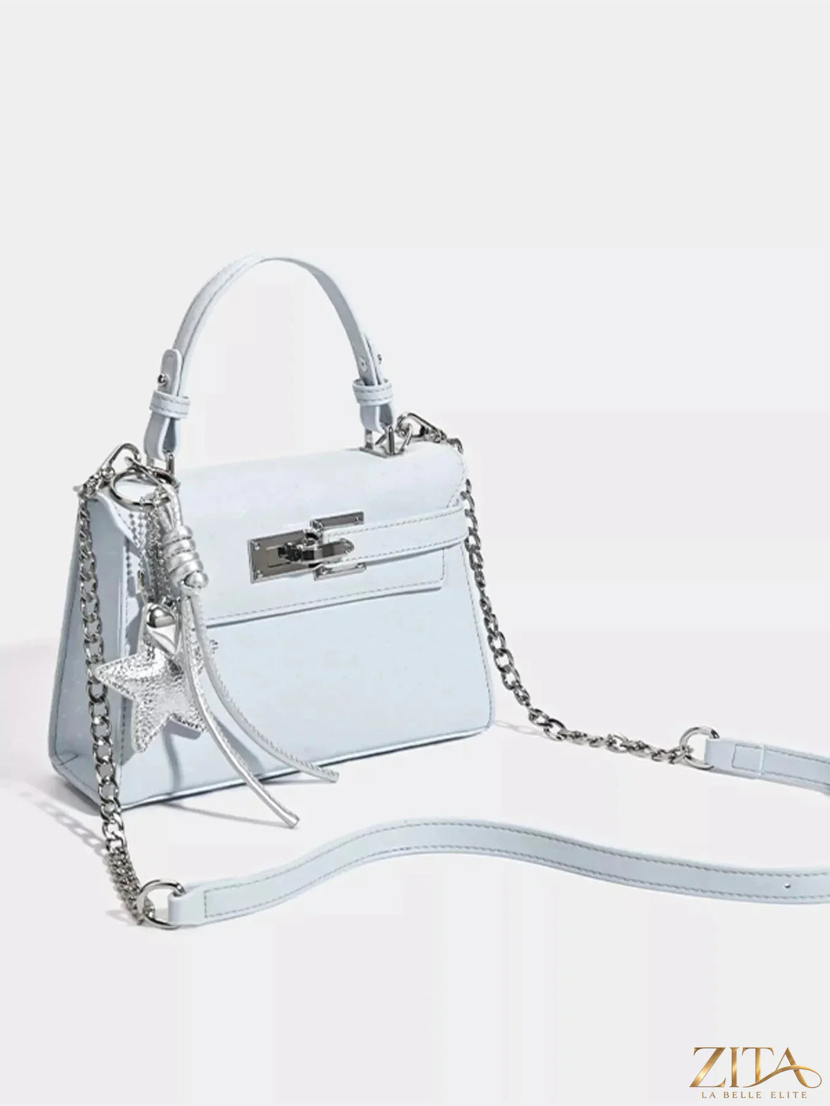 Zita La Belle Elite leather handbag with buckle closure, stylish accessory featuring a sleek design and high-quality leather.