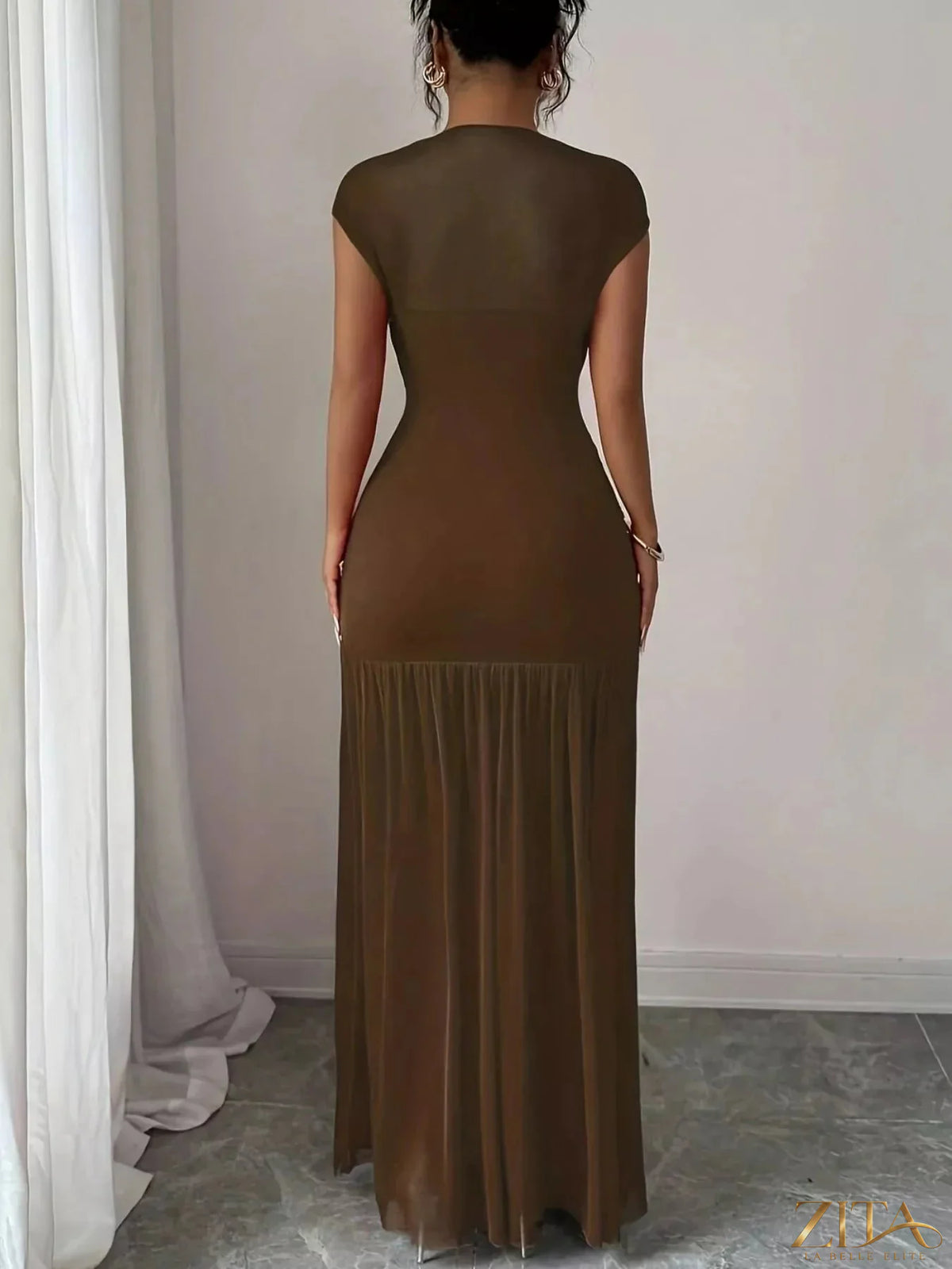 Zita La Belle Elite ruched bodycon maxi dress in black, fitted design with a high neckline and elegant draping.
