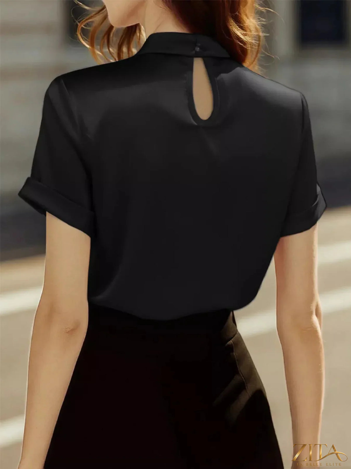 Zita La Belle Elite satin short sleeve blouse with keyhole neckline, featuring a chic and elegant design.