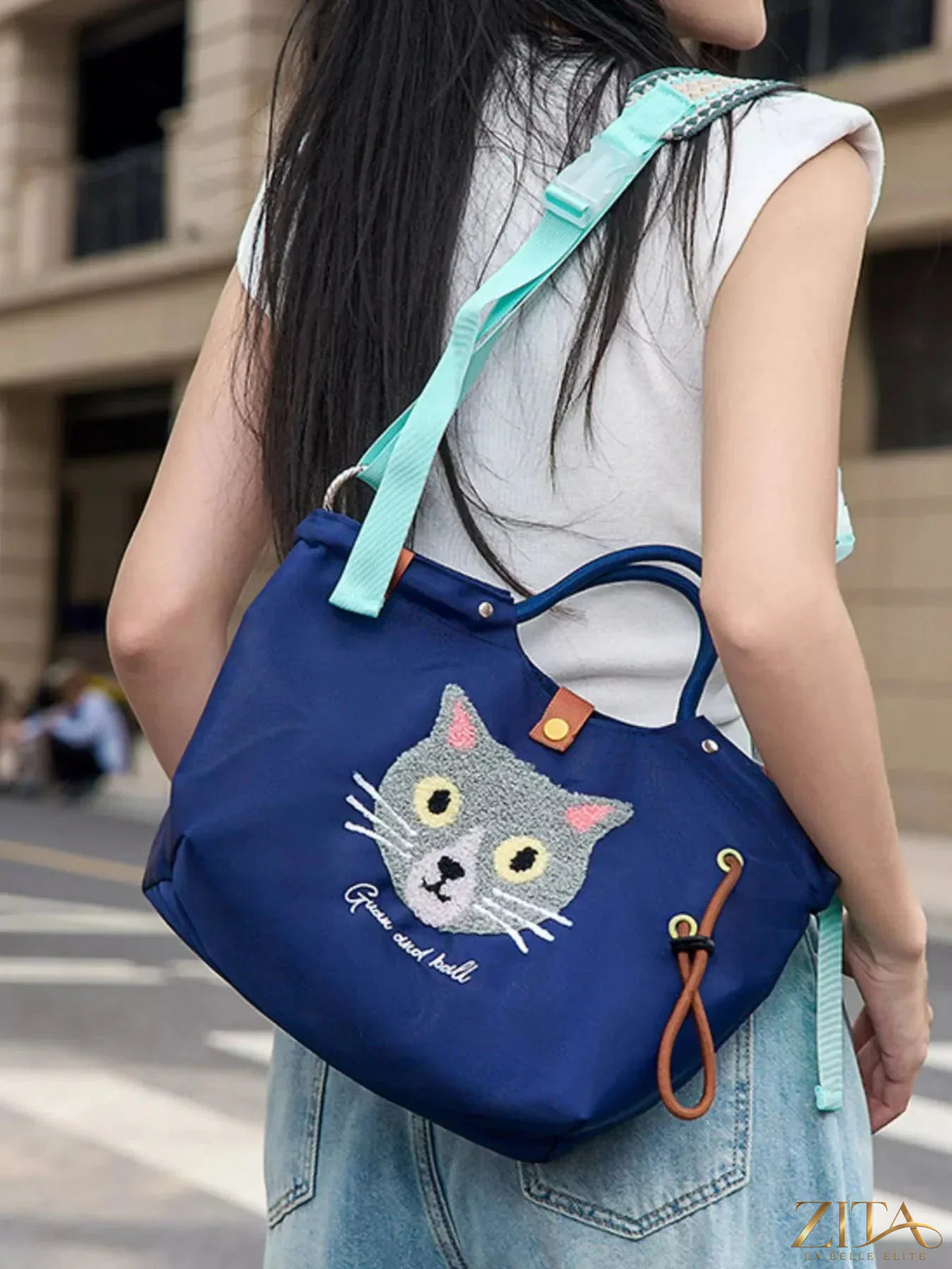 Embroidered cat tote bag from Zita La Belle Elite featuring an adjustable shoulder strap and detailed feline design.