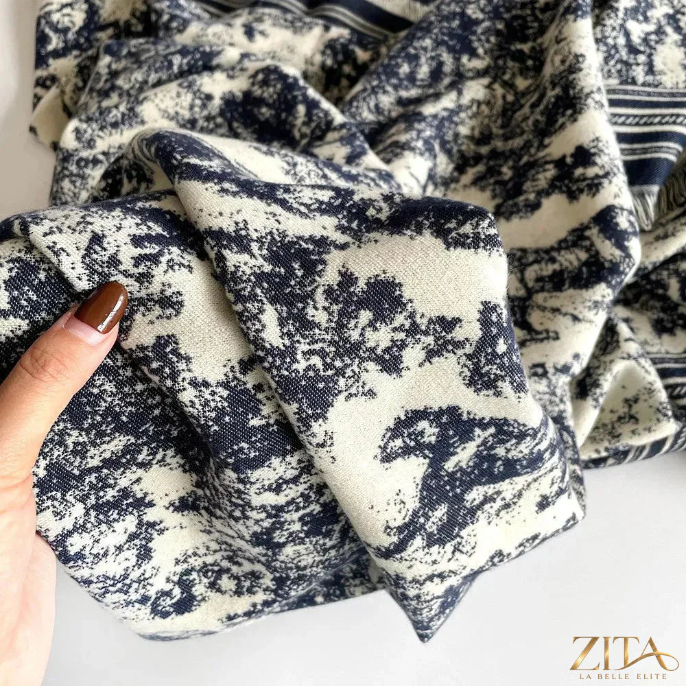 Printed raw hem scarf from Trendsi featuring a lightweight, patterned fabric with frayed edges for a casual, stylish look.