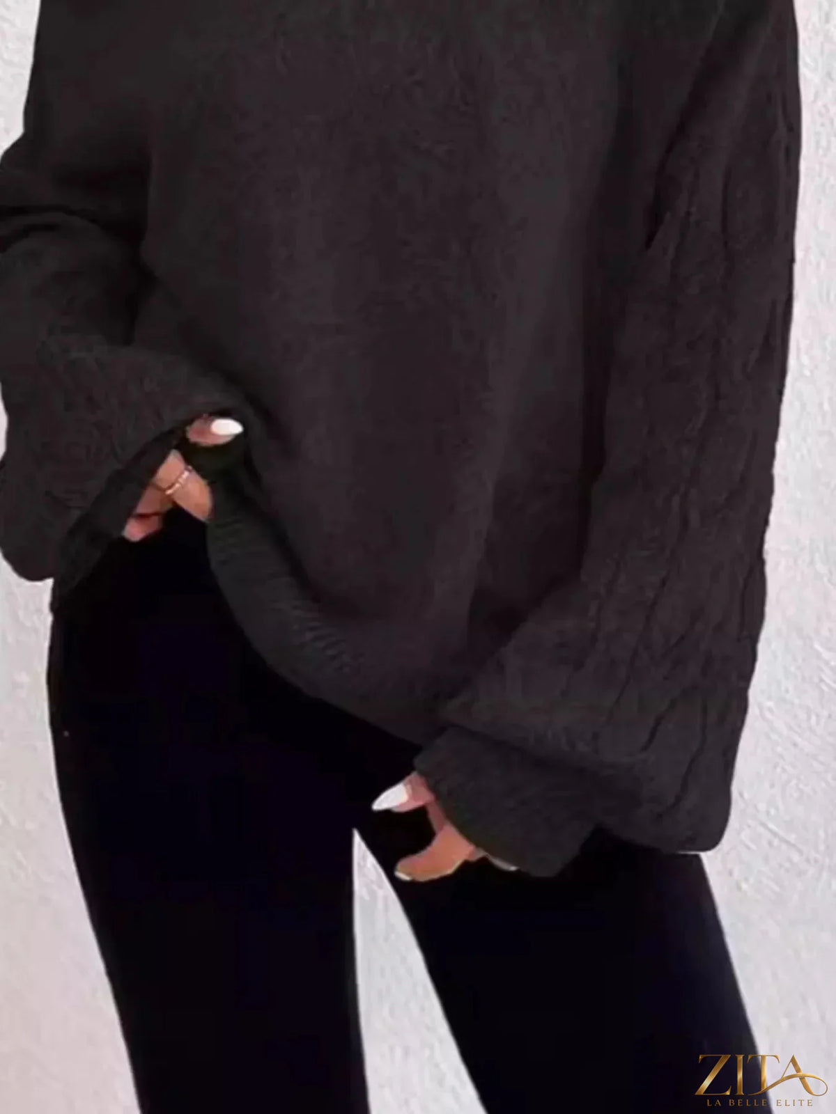 Zita La Belle Elite cold shoulder turtleneck sweater in soft knit fabric, featuring cut-out shoulder design and fitted style.