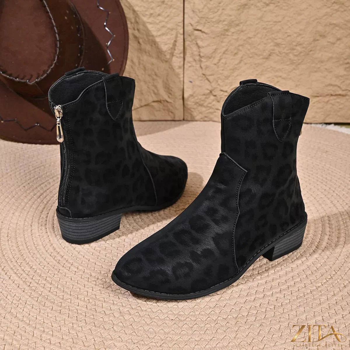 Leopard print western ankle boots from Trendsi with pointed toes and a low heel, showcasing a stylish animal print design.