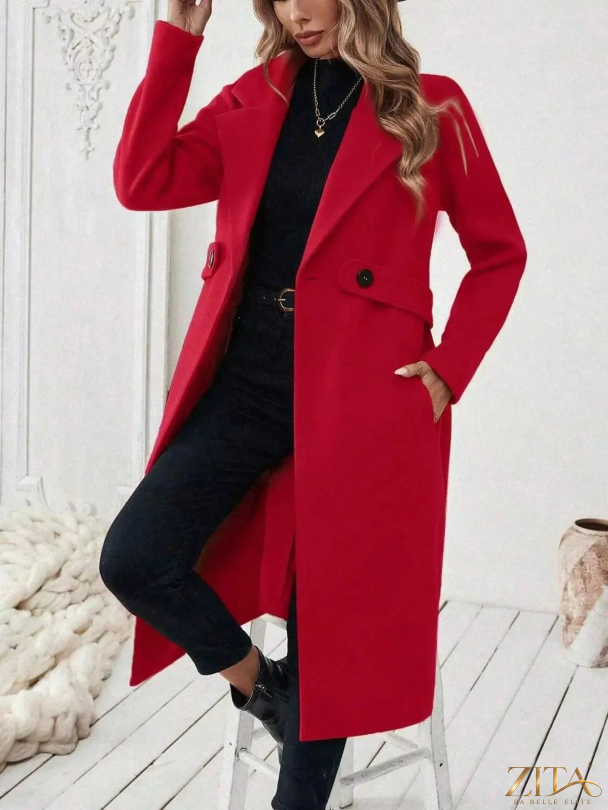 Zita La Belle Elite single-button longline coat displayed on a hanger, featuring a sleek design and tailored fit in neutral fabric.