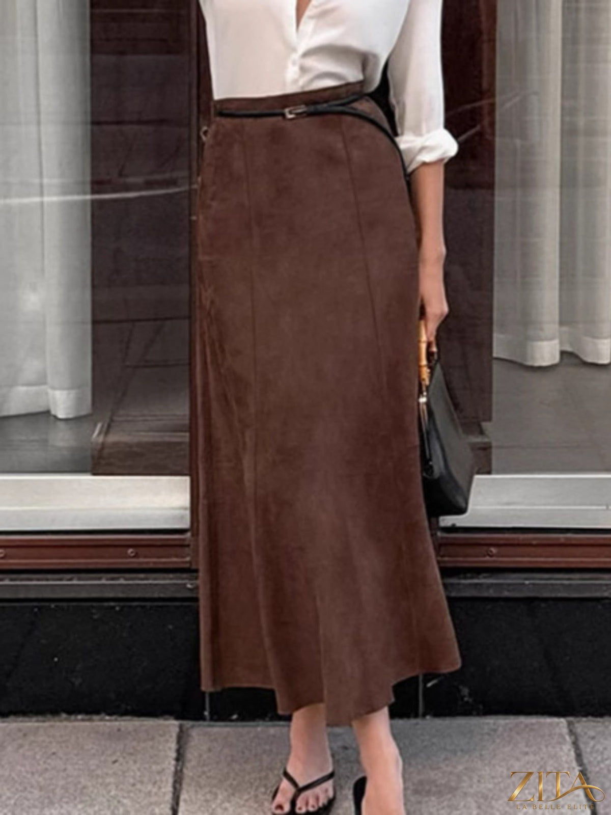 Tan suede midi skirt from Trendsi with a high waist and flowing silhouette, perfect for stylish everyday wear.