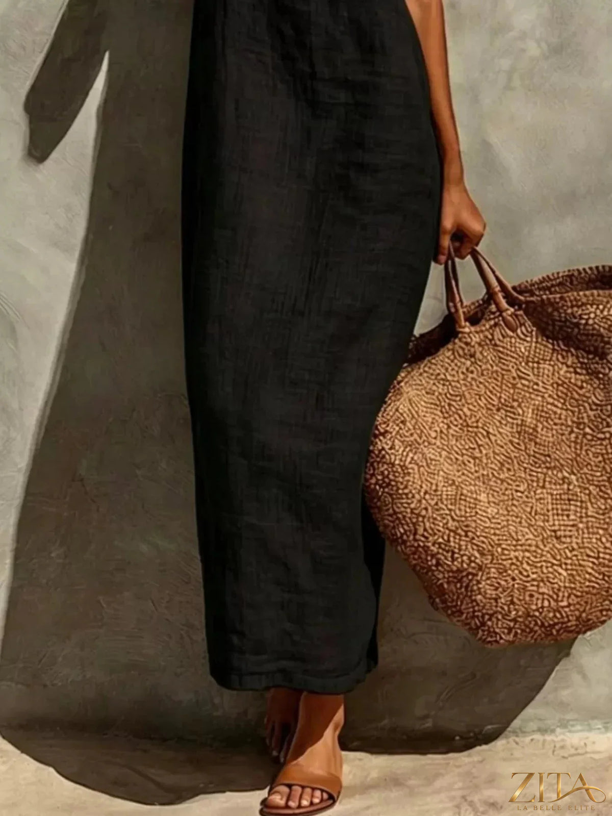 Zita La Belle Elite sleeveless linen casual maxi dress displayed on a hanger with a flowing design and light fabric.