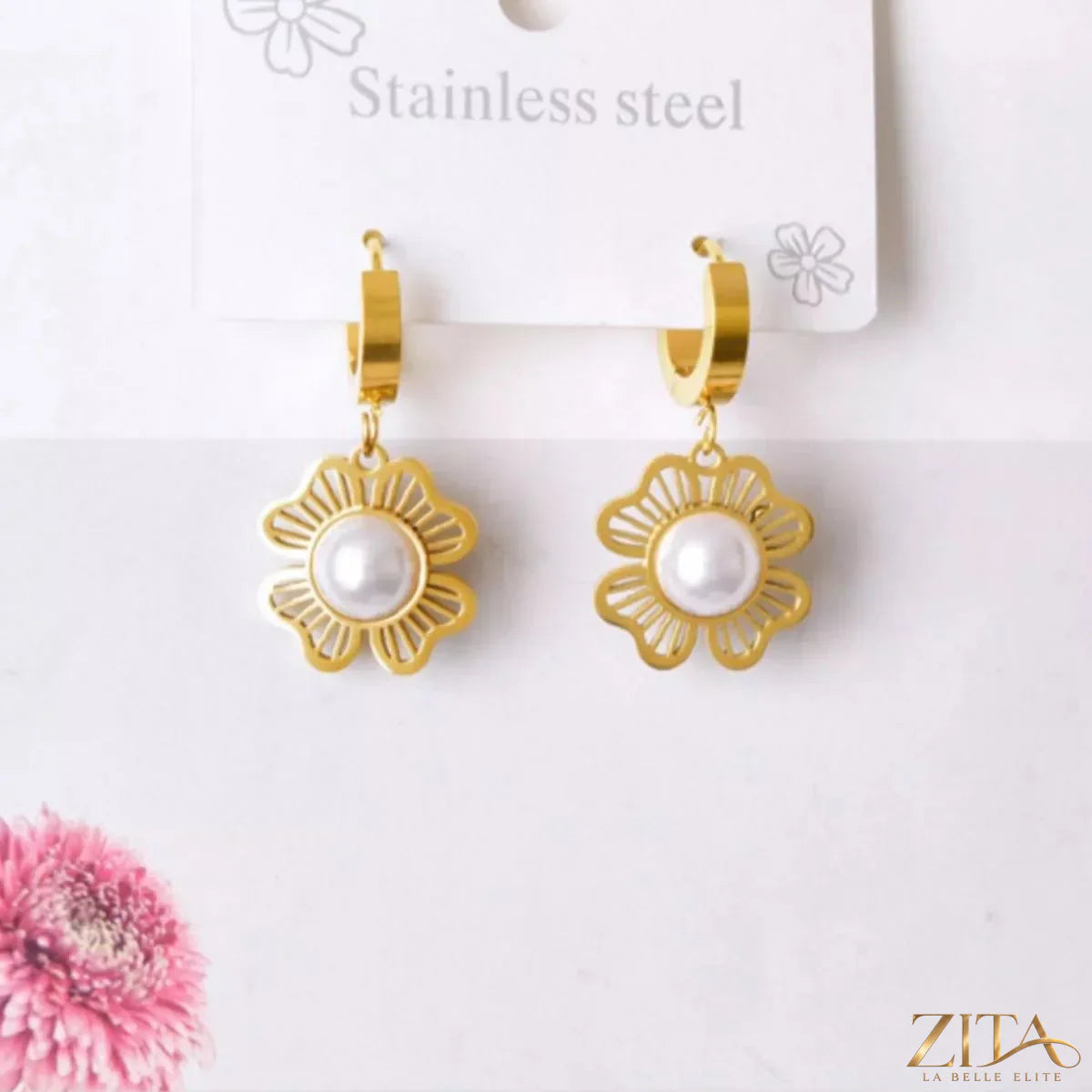 18K gold-plated flower jewelry set with earrings and necklace, featuring delicate floral designs and intricate detailing.